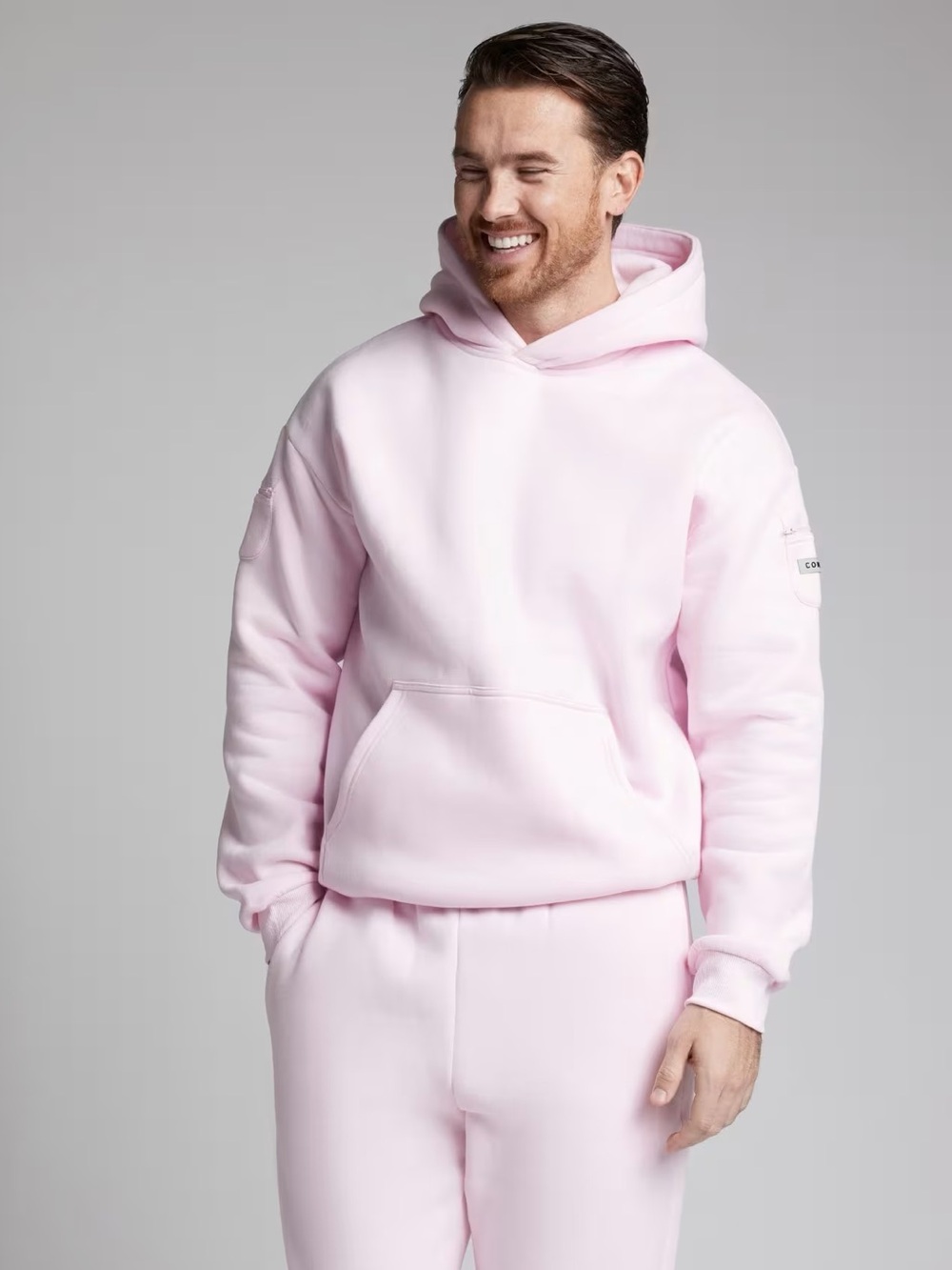 Comfrt Travel Essential Hoodie in Powder Pink